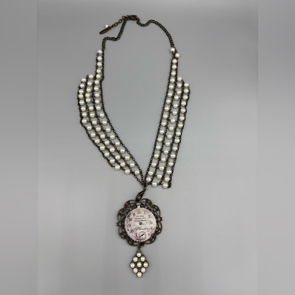 Plunder Pearl and Brass Faux Face clock Necklace